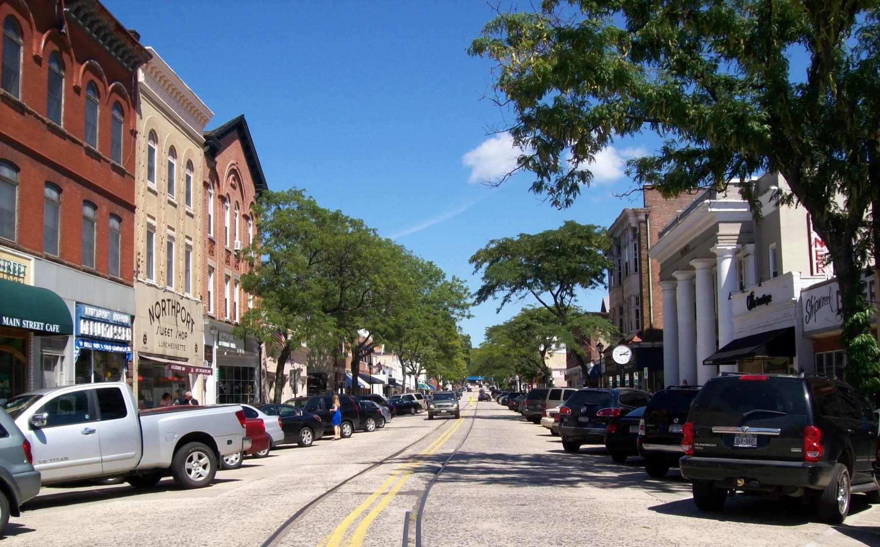 Shops and buildings along Main Street in Northport, New York.