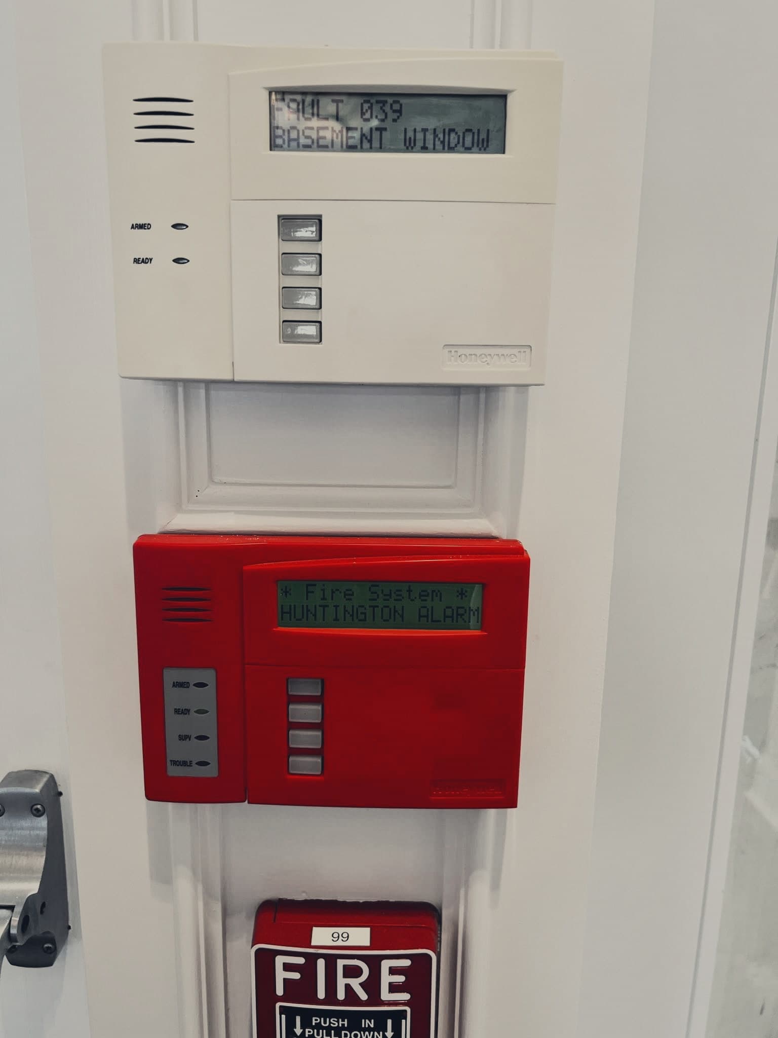 A stack of fire alarm control panels.